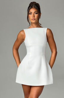 https://cdn.shopify.com/s/files/1/2060/7491/files/alana-mini-dress-ivory-dress-babyboo-fashion-31216136093759.jpg?v=1757595069